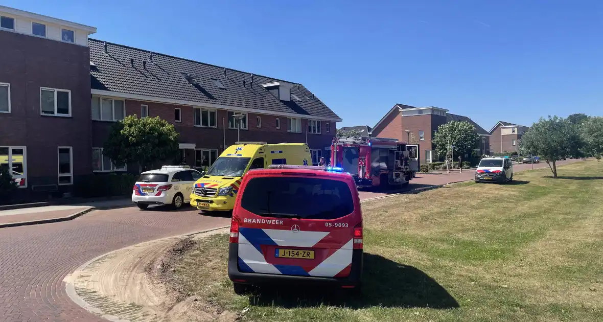 Persoon zwaargewond bij brand in woning - Foto 1
