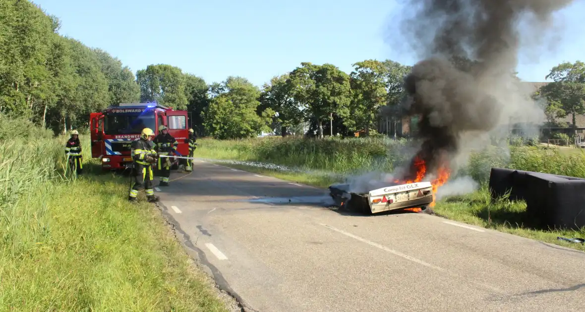 Vouwwagen vat vlam tijdens rijden - Foto 14