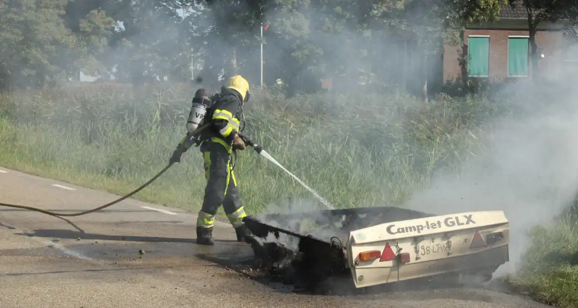 Vouwwagen vat vlam tijdens rijden - Foto 16