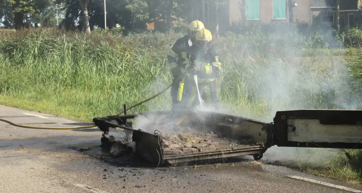 Vouwwagen vat vlam tijdens rijden - Foto 17