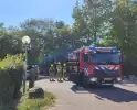 Auto vat vlam op parkeerterrein vakantiepark BreeBronne