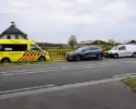 Kop-staartbotsing bestelbus en personenauto