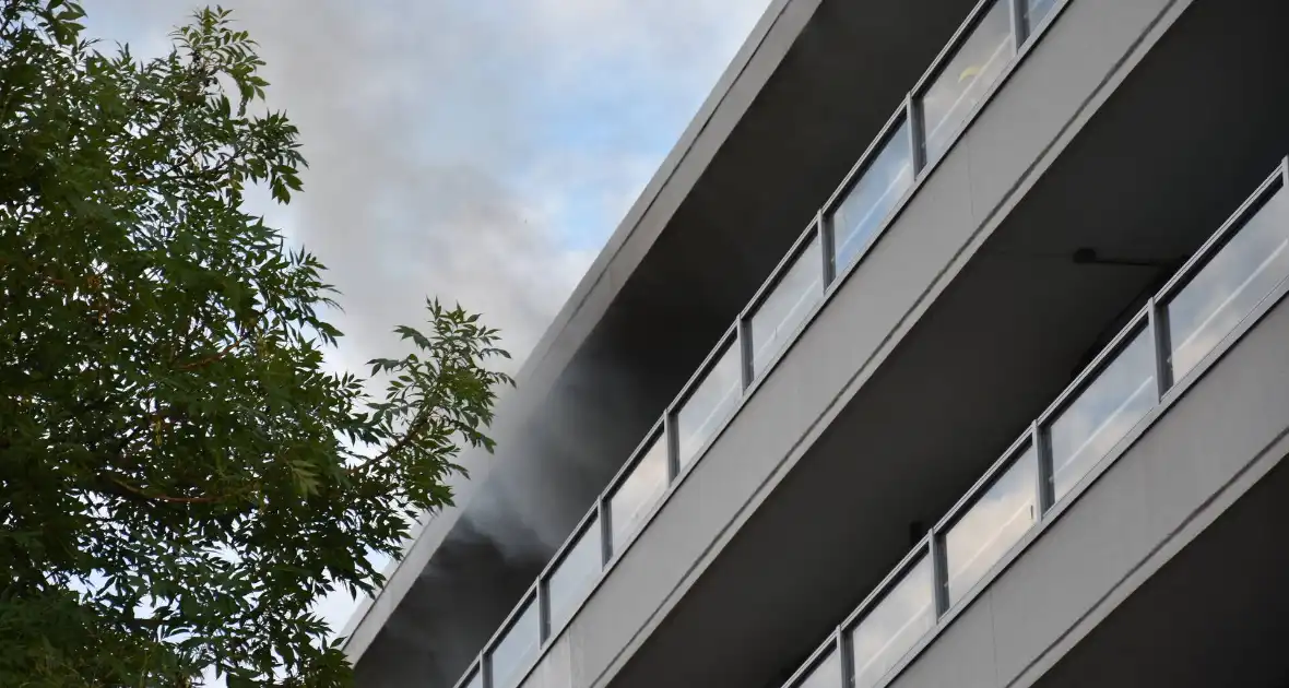 Ontruiming bij brand in flat - Foto 11