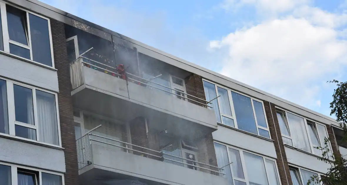 Ontruiming bij brand in flat - Foto 4