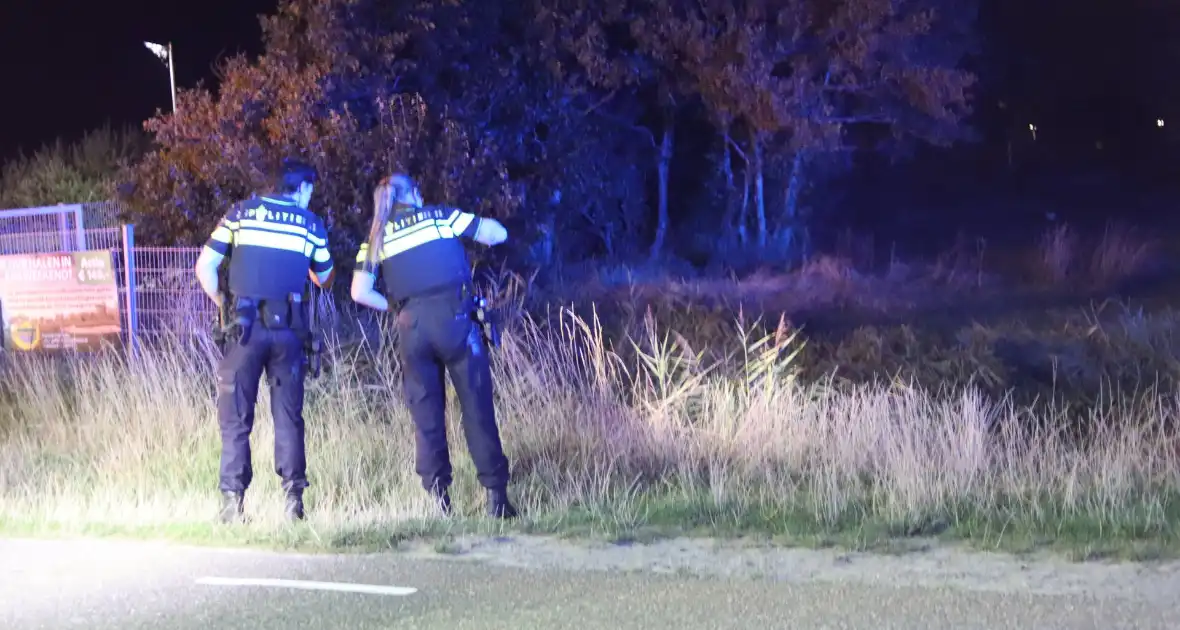 Twee gewonden bij auto te water - Foto 3