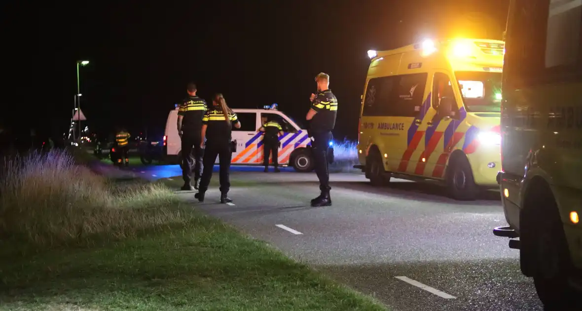 Twee gewonden bij auto te water - Foto 6