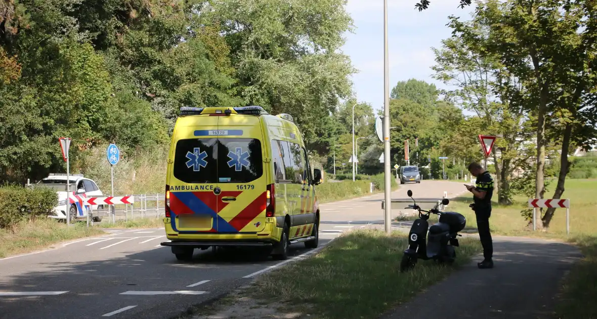 Bestuurder elektrische scooter gewond na val - Foto 1