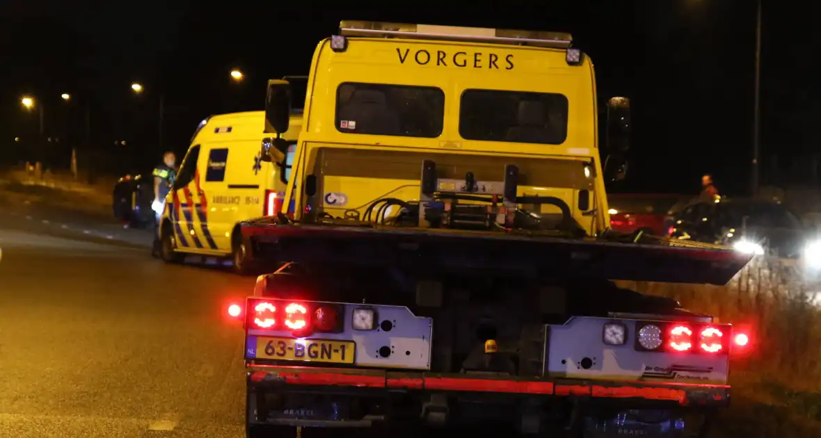 Personenauto belandt op zijn zijkant - Foto 2