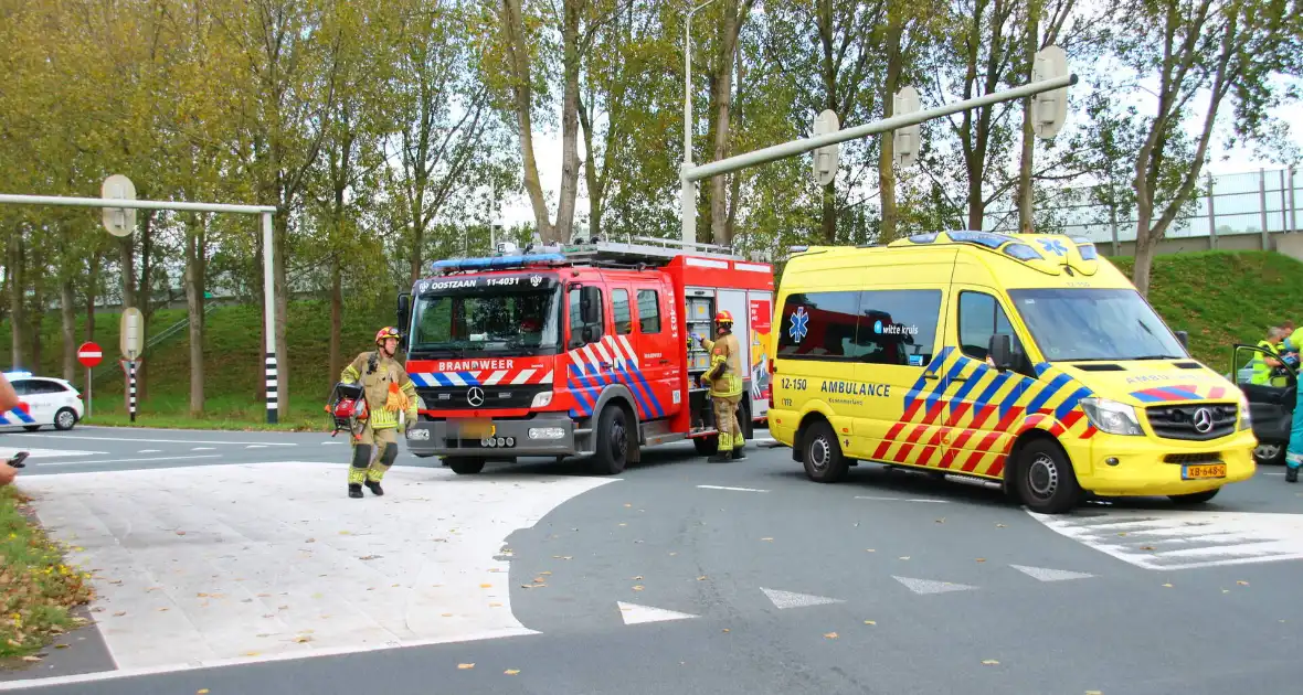 Persoon bekneld na ongeval op kruising - Foto 9