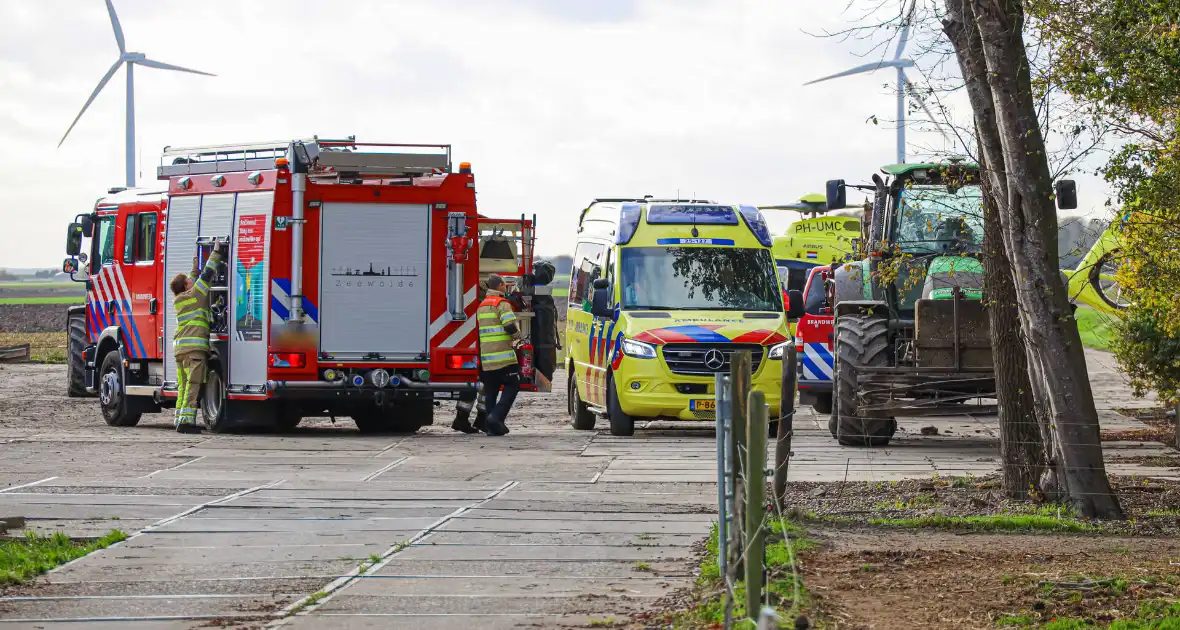 Man raakt op agrarisch bedrijf bekneld in een machine - Foto 1