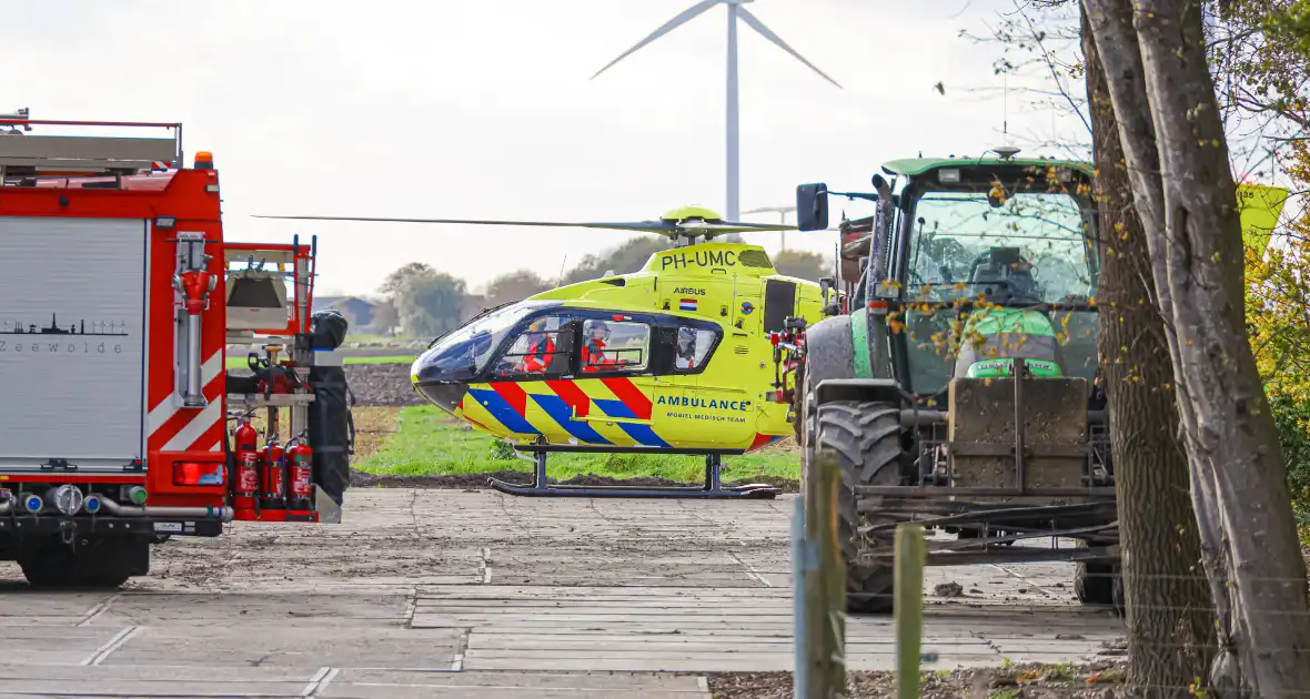 Man raakt op agrarisch bedrijf bekneld in een machine - Foto 3
