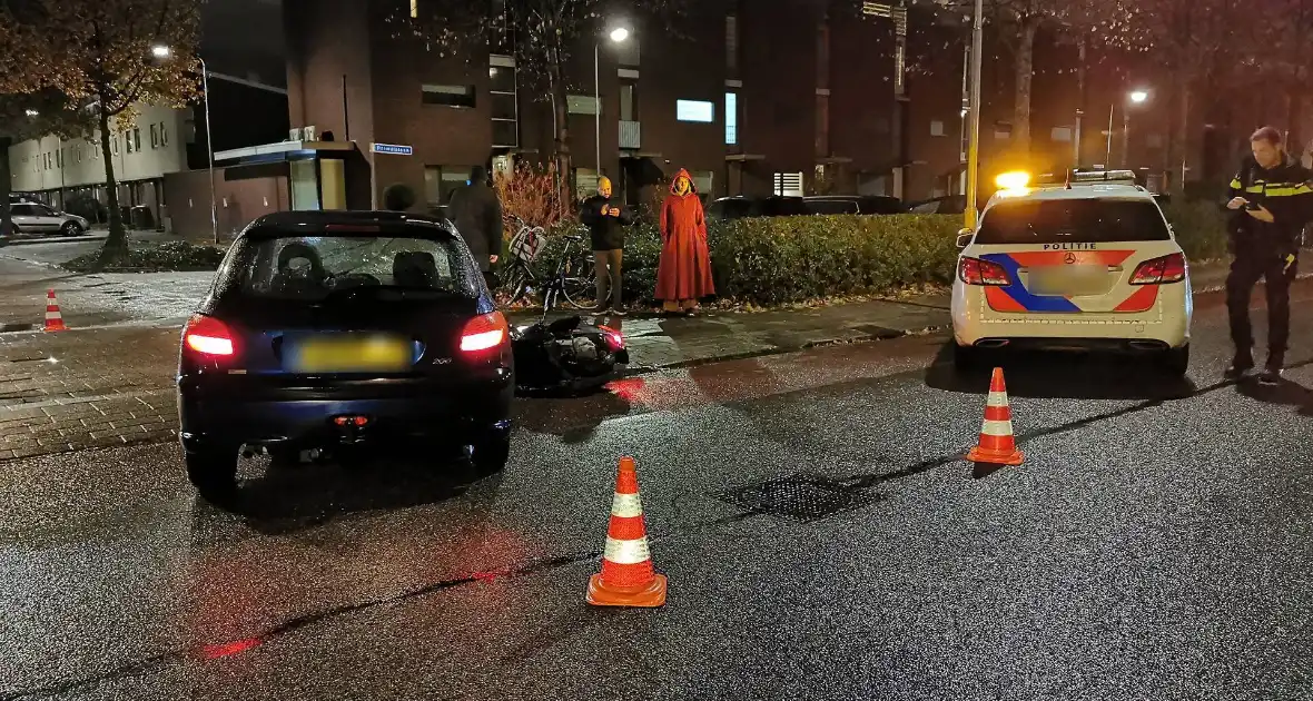 Scooterrijder en automobilist in botsing - Foto 5