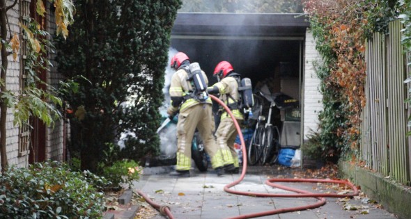 Motor in brand in garage van woning - Afbeelding 9