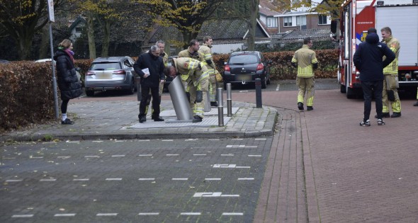 Brandweer vist sleutelbos op uit container - Afbeelding 2