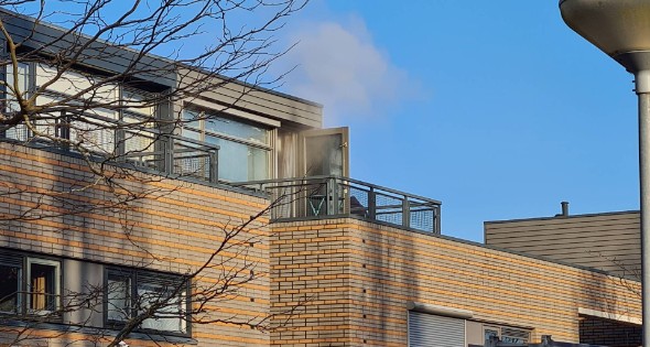Veel rook bij brand in rijtjeswoning - Afbeelding 3
