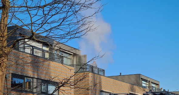 Veel rook bij brand in rijtjeswoning - Afbeelding 5