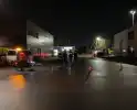 Vrachtwagen in brand in werkplaats