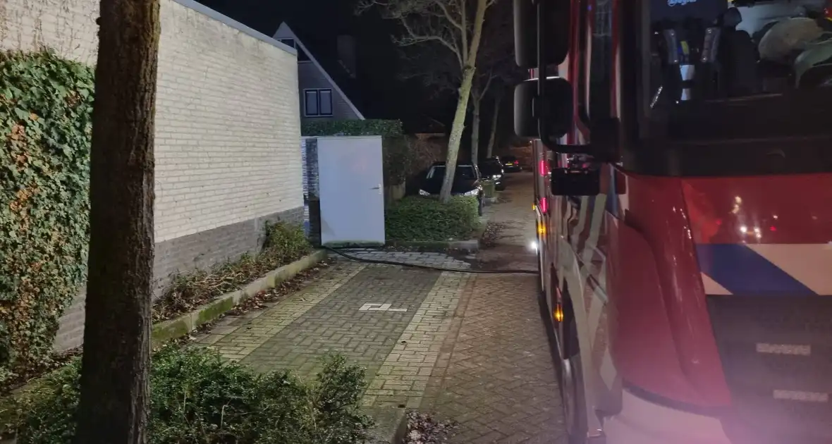 Kliko's in brand in achtertuin van woning - Foto 3