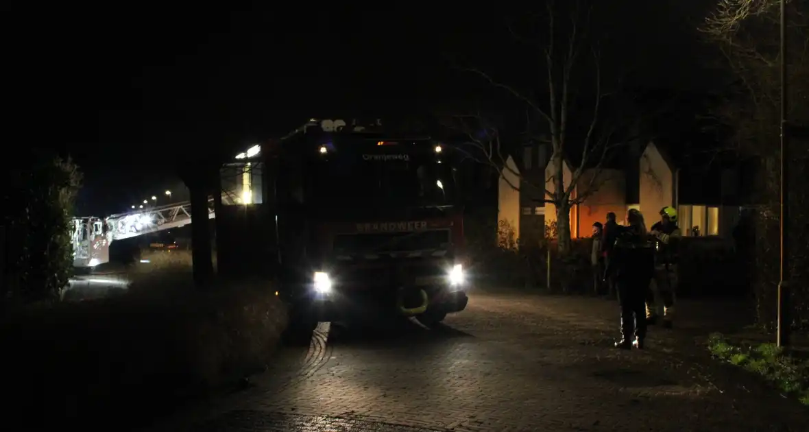 Tuinhuis volledig verwoest door brand, woningen ontruimd - Foto 4