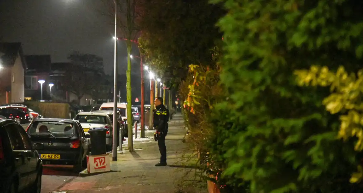 Twee aanhoudingen na schietpartij in woning - Foto 6