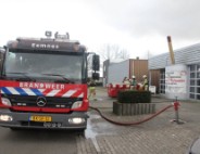 Brand in container met bouwafval snel onder controle