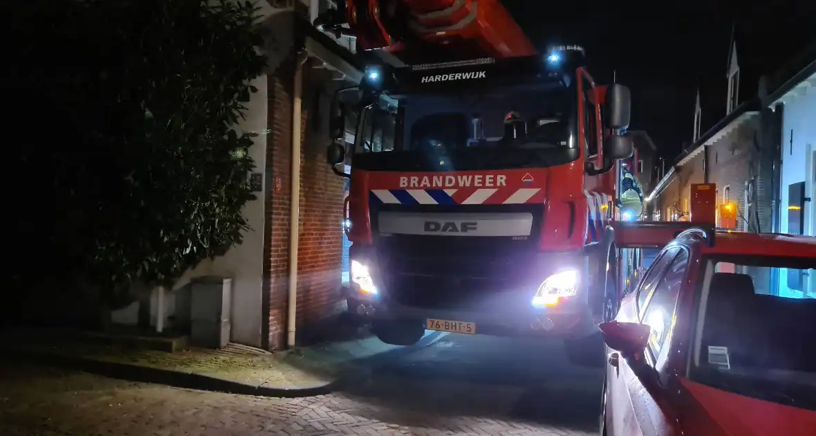 Schoorsteenbrand bij woning in binnenstad - Foto 1
