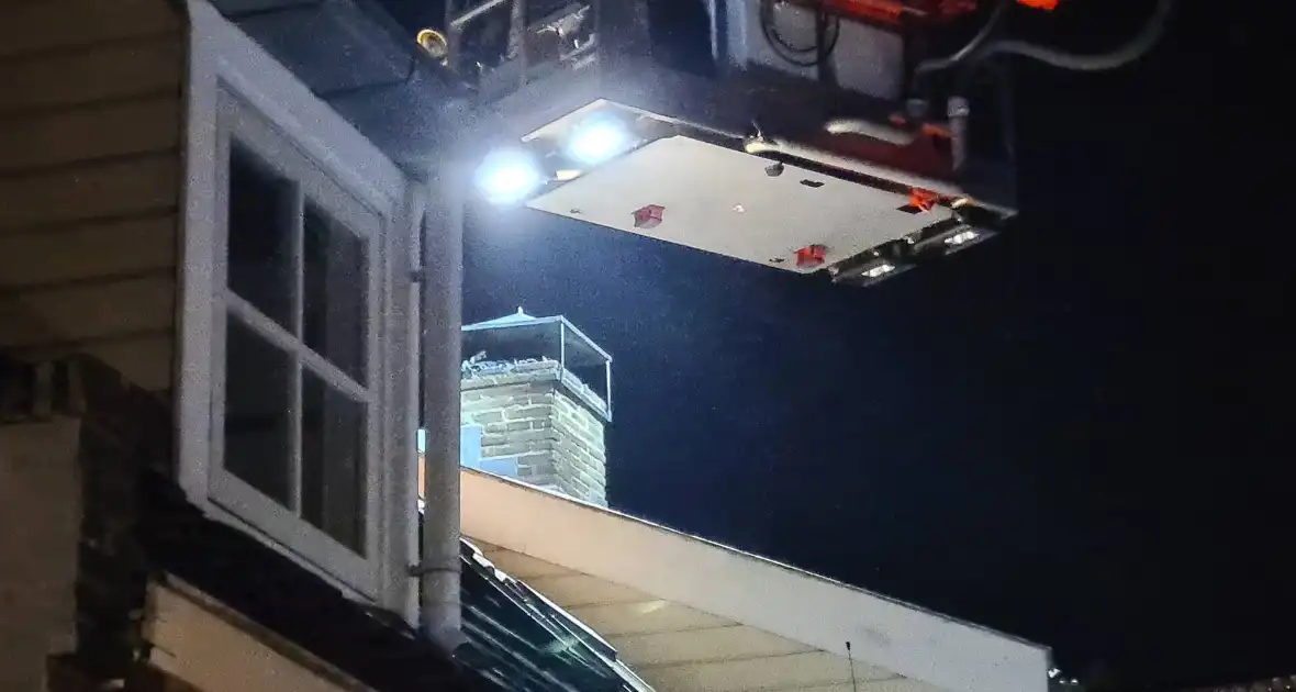 Schoorsteenbrand bij woning in binnenstad - Foto 2