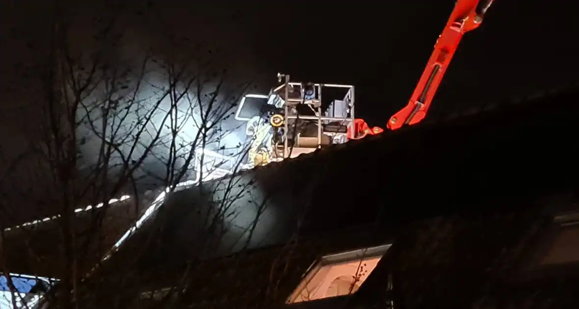 Schoorsteenbrand bij woning in binnenstad - Foto 4