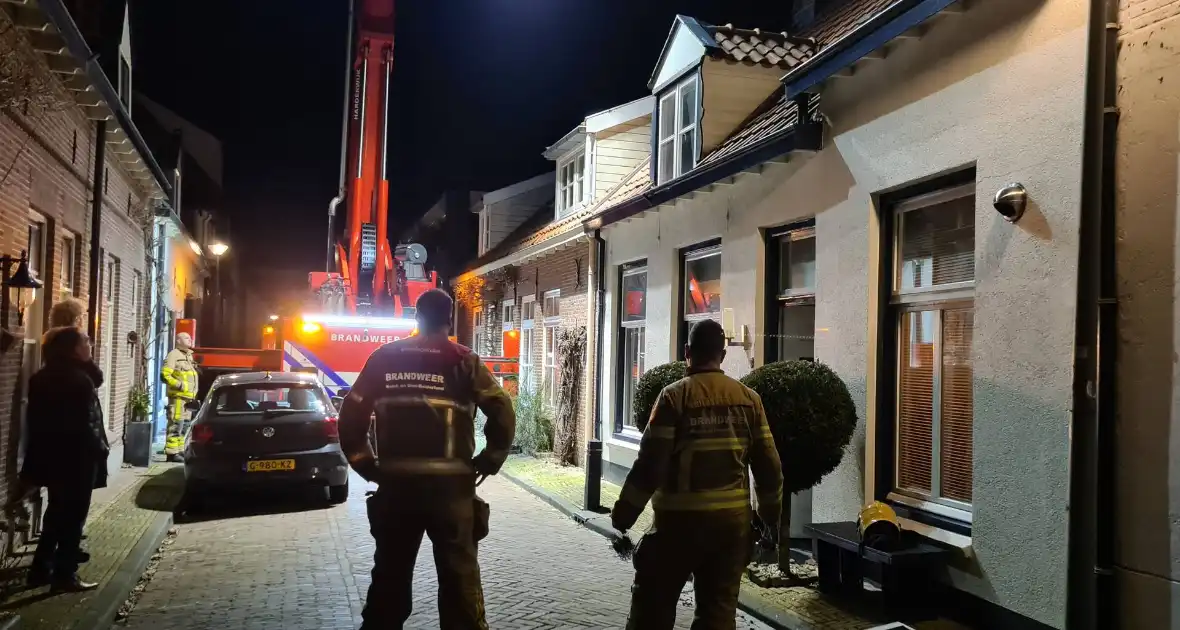 Schoorsteenbrand bij woning in binnenstad - Foto 6