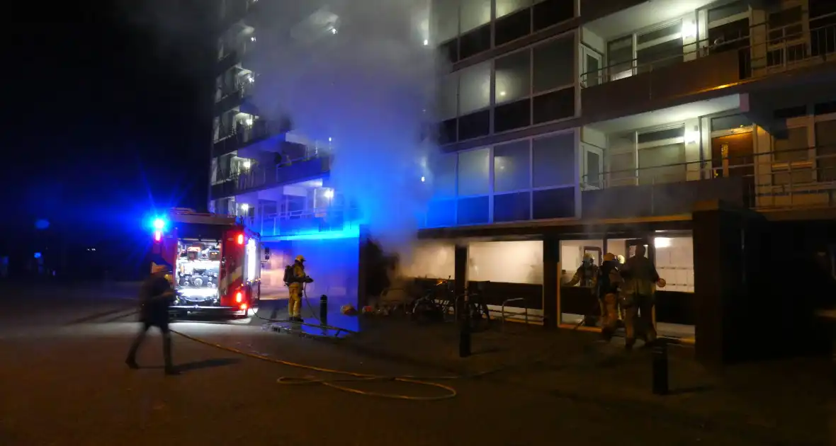 Rook in flat wegens afvalbrand - Foto 5