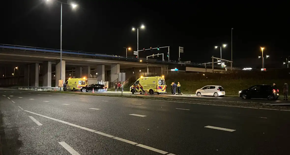 Auto op ze kop in de berm - Foto 9