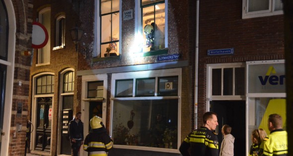 Woning beschadigd door brand - Afbeelding 1