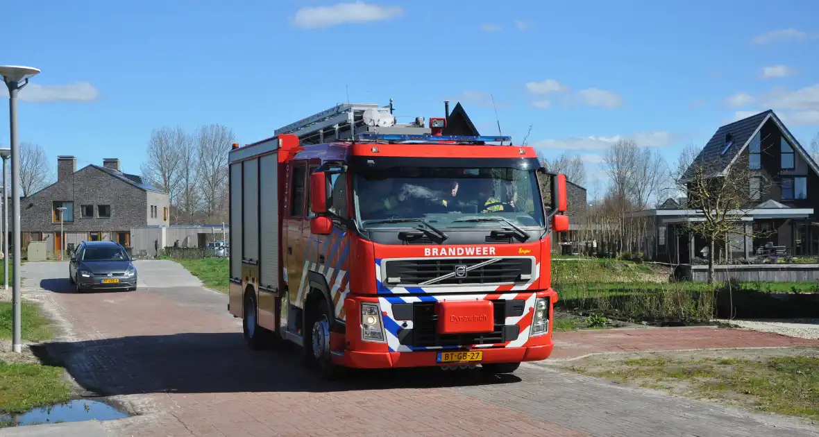 Fiets vat vlam in tuin van woning - Foto 5