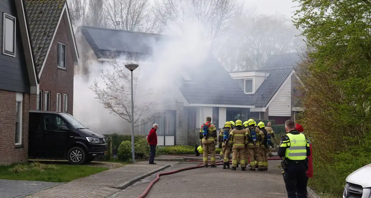 Woning beschadigd door brand in schuur - Foto 4