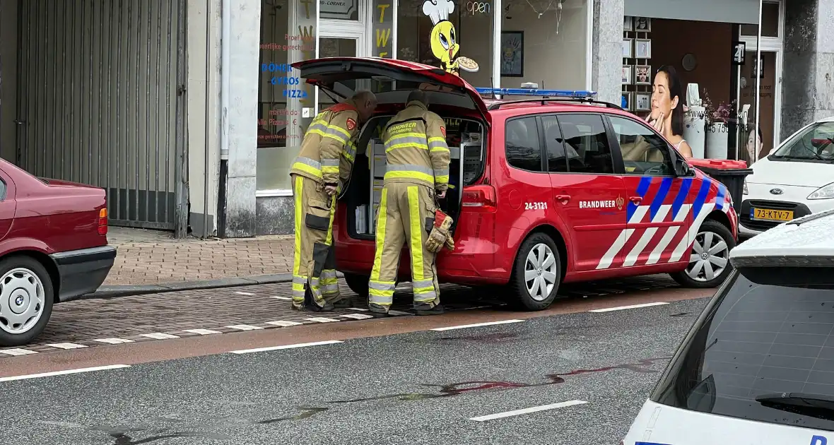 Politie en brandweer doen onderzoek in pand - Foto 3