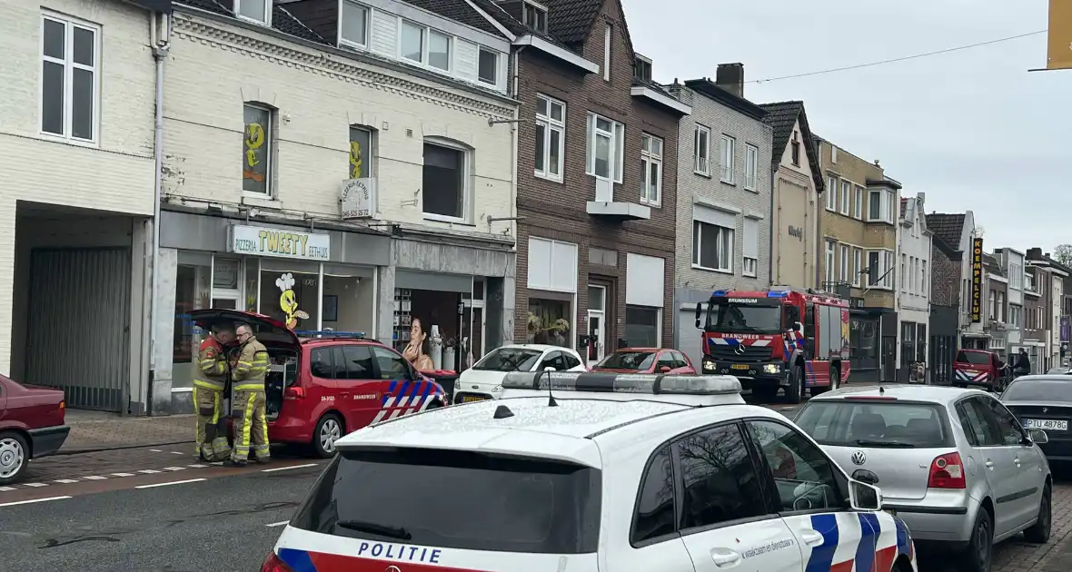 Politie en brandweer doen onderzoek in pand - Foto 4