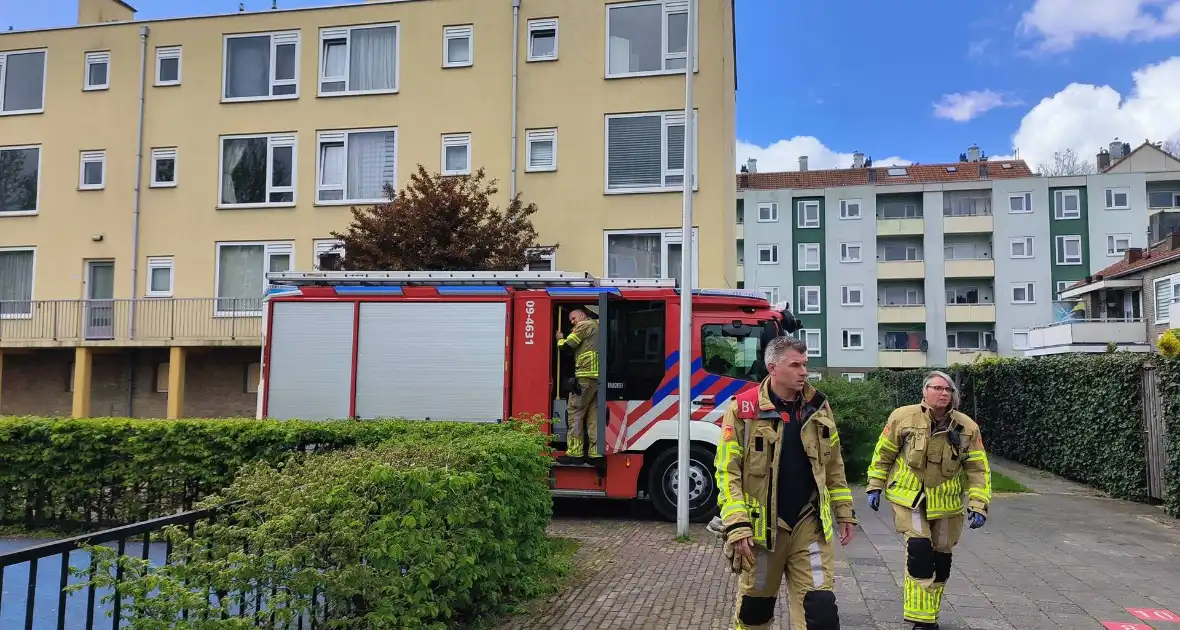 Veel rook bij kleine brand in woning - Foto 8