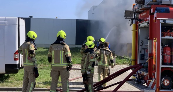 Flinke rookontwikkeling bij brand in haakarm container - Afbeelding 4