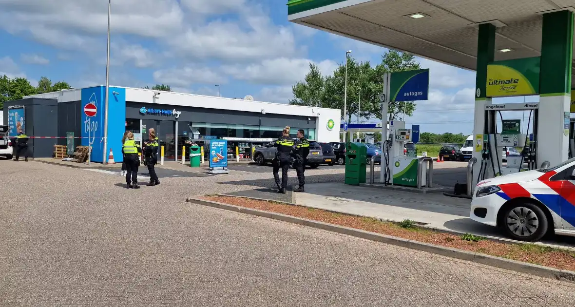 Politie doet onderzoek naar schietpartij BP-tankstation - Foto 2