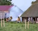 Brand naast schuur van boerderij