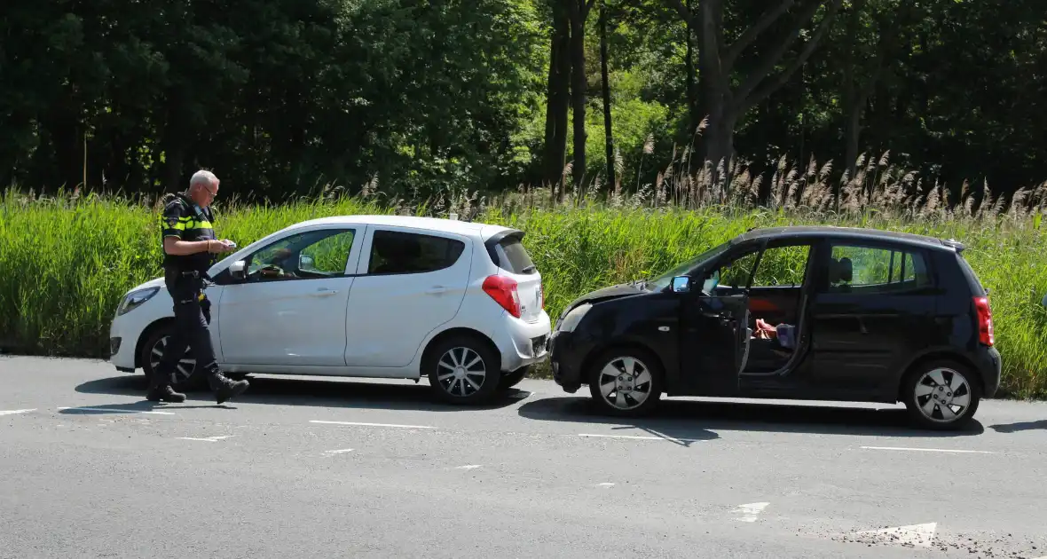 Schade bij kop-staartbotsing op afslag