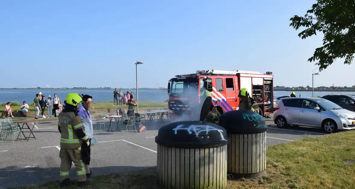 Container in brand door BBQ