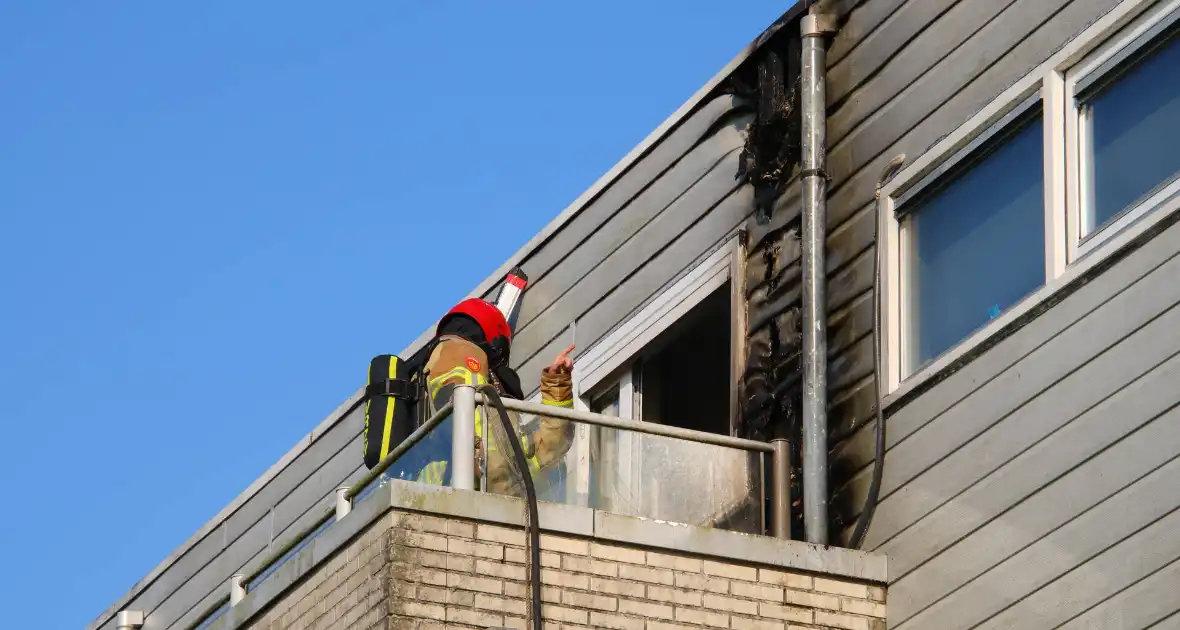 Flinke brandschade aan woning - Foto 4