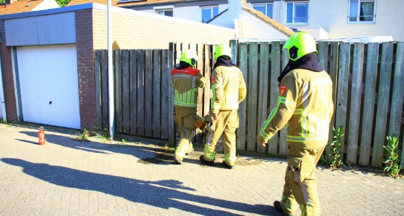Brandstichting bij schutting van woning - Afbeelding 5