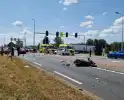 Twee opzittenden van scooter zwaargewond