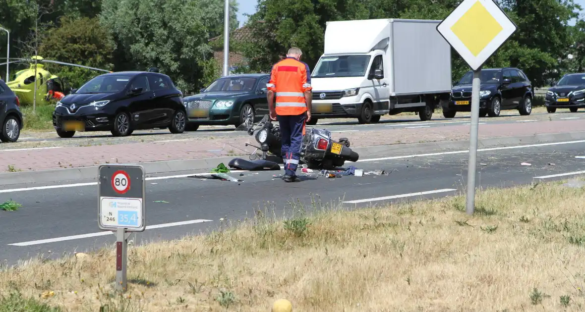 Twee opzittenden van scooter zwaargewond - Foto 6