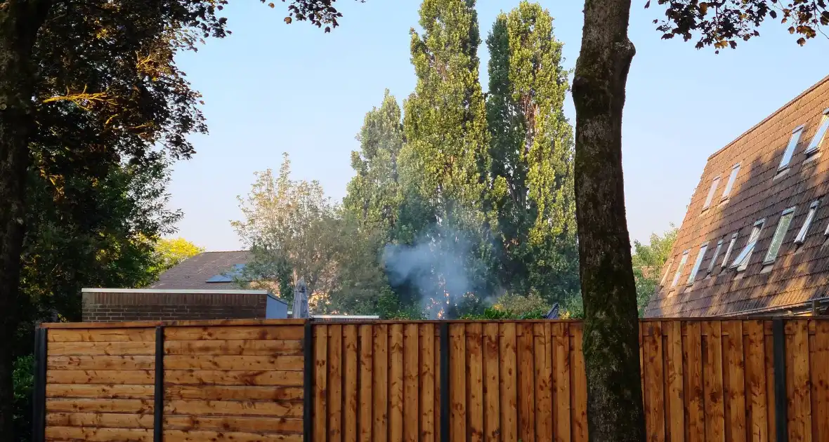 Brand in achtertuin geblust - Foto 6