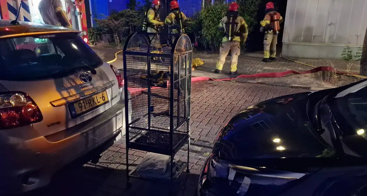 Buurman ontdekt brand in woning - Foto 1