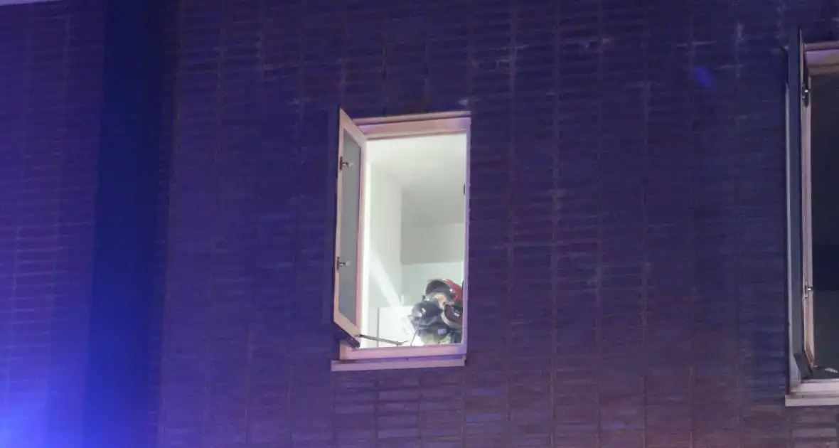 Buurman ontdekt brand in woning - Foto 13