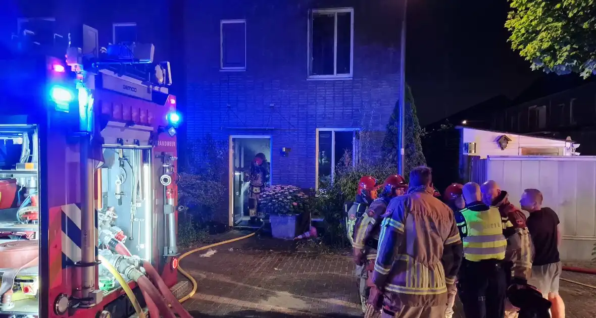 Buurman ontdekt brand in woning - Foto 2